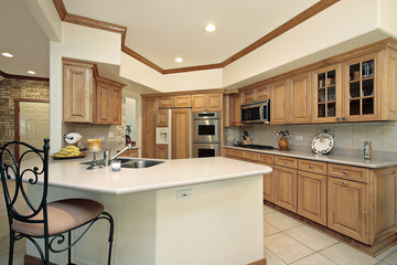 Kitchen with oak wood cabinetry