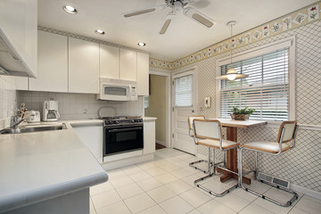 Kitchen with white cabinetry