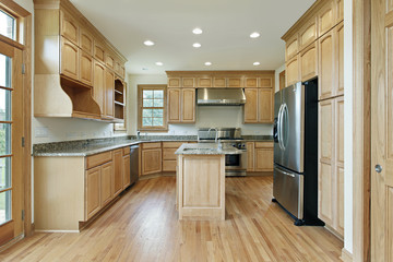 Kitchen with oak wood cabinetry