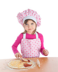 Little girl cooking pizza