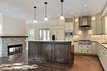 Kitchen with stone fireplace