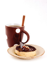 cup of coffee and chocolate tart