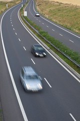 highway traffic (motion blurred image, color toned image)