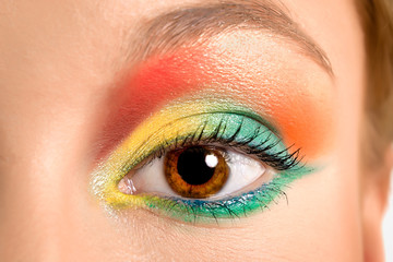 Obraz premium Women eye, close-up, painted in different colours