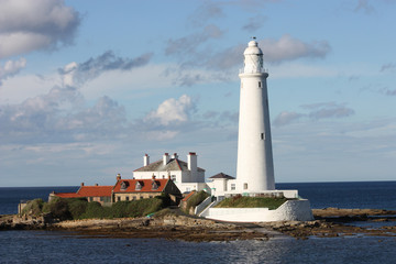 A White Island Lighthouse with Associated Buildings.