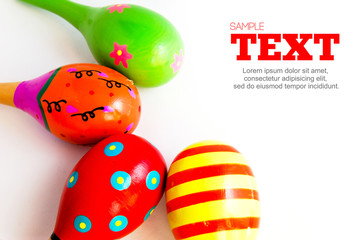 colorful maracus with copyspace area