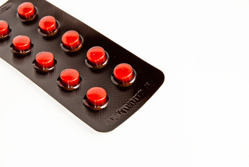 pack of orange medicine pills isolated