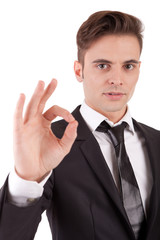 Business man signaling ok