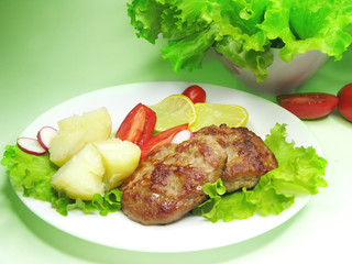 cooked meat cutlets with vegetables