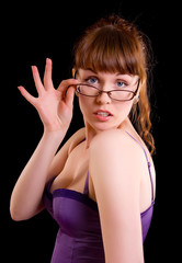 Young beauty woman with glasses looking at camera