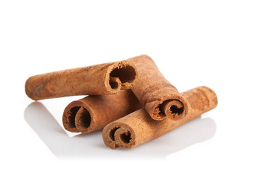 Cinnamon sticks close-up on white background