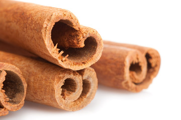 Cinnamon sticks on white background