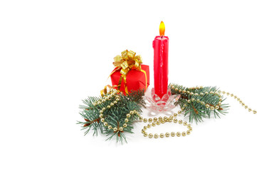christmas composition from a candle, branches of a fur-tree, a g