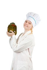 female cook with  tin of pickled vegetables