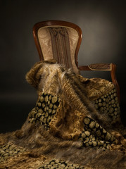 Elegant chair with fur blanket