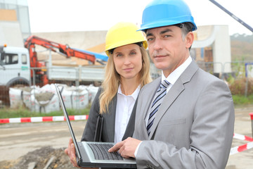 Business people on construction site