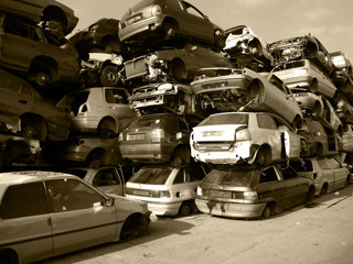 The old broken cars on a dump