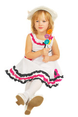 Little girl with lollipops  isolated