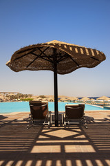 Swimming pool umbrella