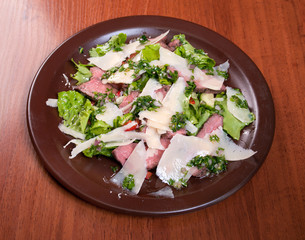 vegetable salad from cheese and ham