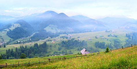 Fototapeta na wymiar mountain ridge and village view