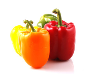 Red green yellow sweet beautiful pepper on white background