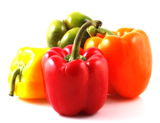 Red green yellow sweet beautiful pepper on white background