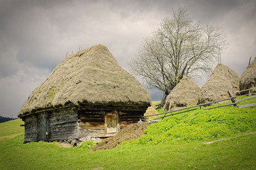 Fototapeta na wymiar Old farmer's wooden house in Transylvania, Romania