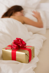 Surprise present - young woman sleeping