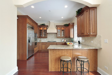 Kitchen with arched entry