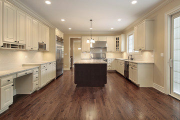 Kitchen with light wood cabinetry