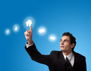 man pressing a touchscreen button