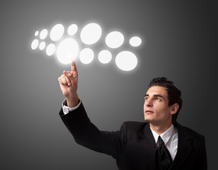 man pressing a touchscreen button