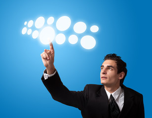 man pressing a touchscreen button
