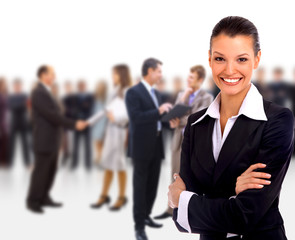 Female Business leader standing in front of her team