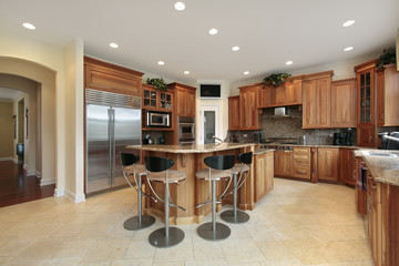Kitchen with bar stools