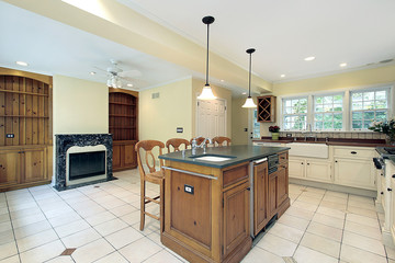 Kitchen with marble fireplace