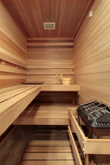 Fototapeta na wymiar Sauna with wooded benches