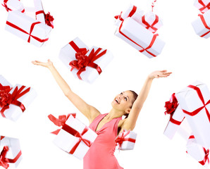 Excited attractive woman with many gift boxes and bags