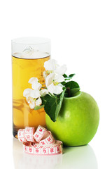 green apple and blossoming branch