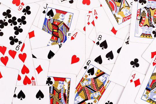 Scattered Playing Cards Face Up Background