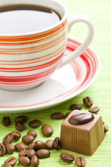 chocolate praline and coffee cup