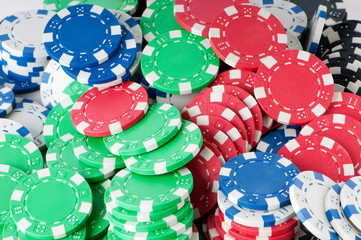 Stack of various casino chips - gambling concept