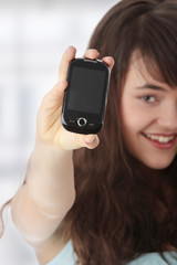 Young caucasian woman using a mobile phone
