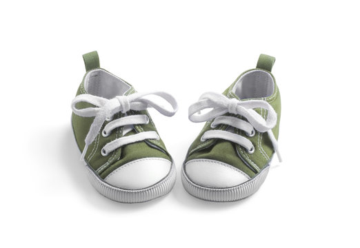 olive baby sneakers on white