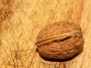 closed walnut on wooden table