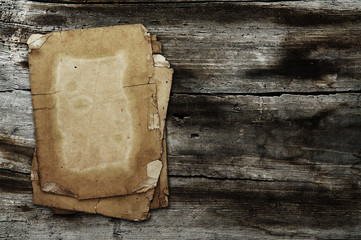 old papers on wooden background