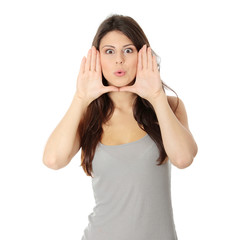 Woman framing her face with hands