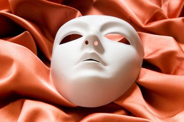 Theatre concept with the white plastic masks