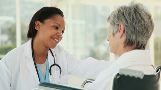Doctor Talking with Her Patient